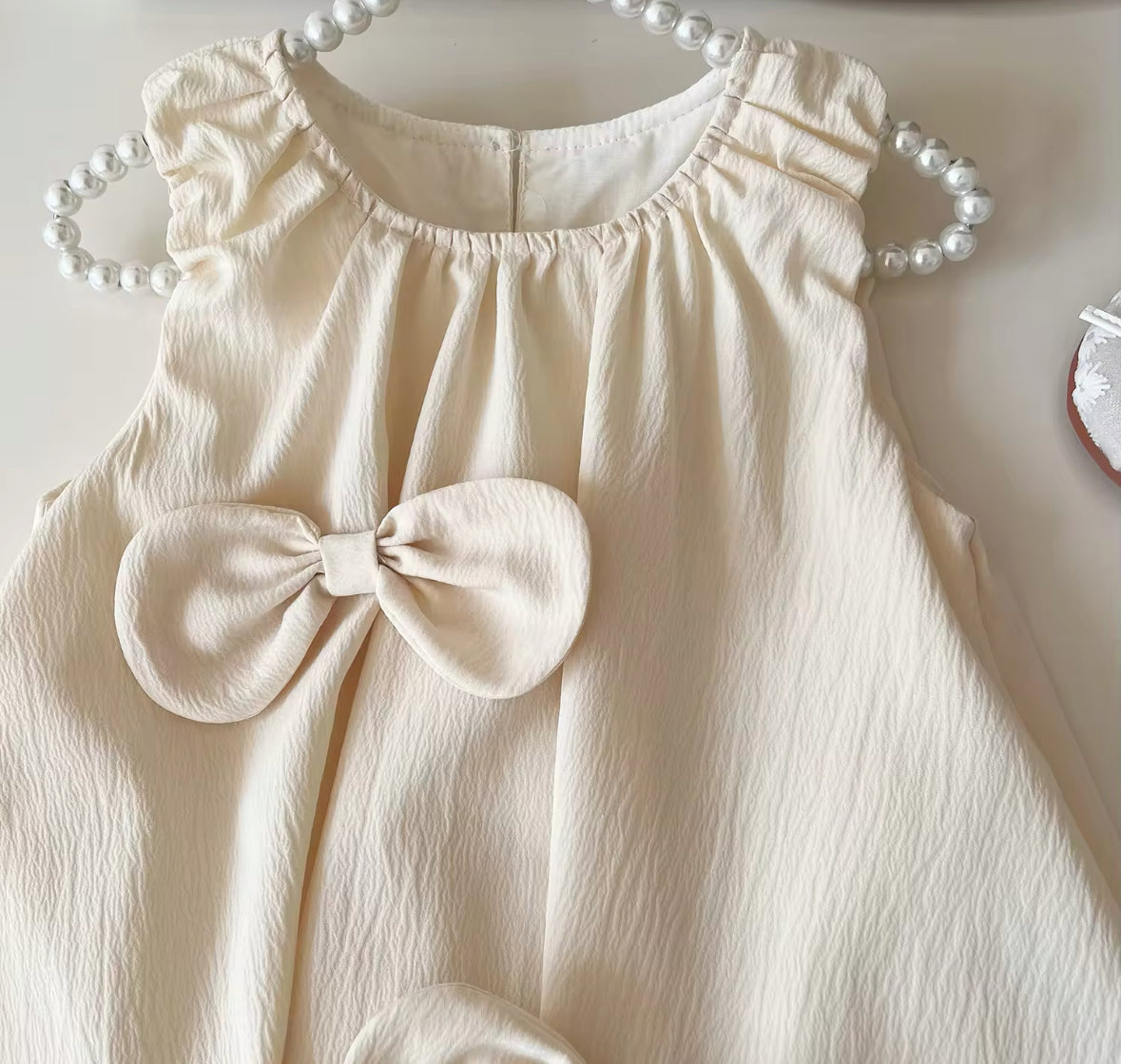 PEARL BOW BUBBLE DRESS